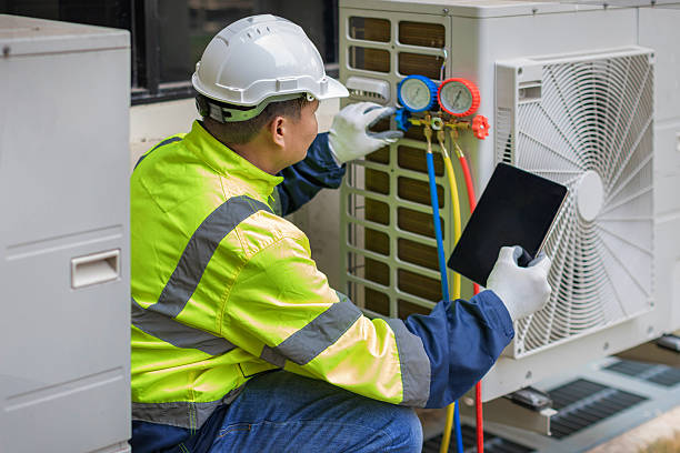 Professional Hvac technician working in Lee, NH